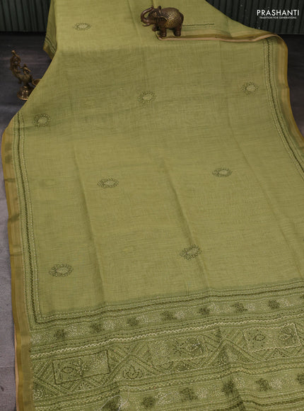 Linen Cotton Saree light green with embroidery buttas and embroidery pallu