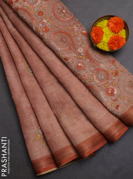 Linen Cotton Saree rust shade with embroidery buttas and embroidery pallu