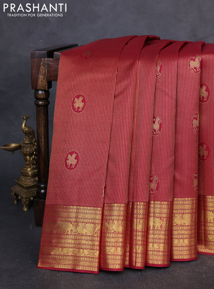 Pure kanchipuram Silk Saree maroon with allover zari woven brocade weaves and rich zari woven border