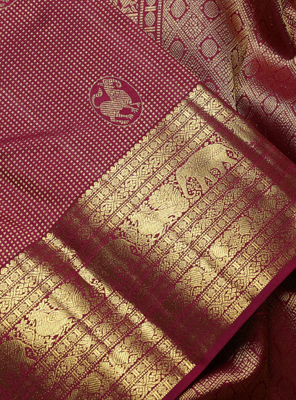 Pure kanchipuram Silk Saree maroon with allover zari woven brocade weaves and rich zari woven border