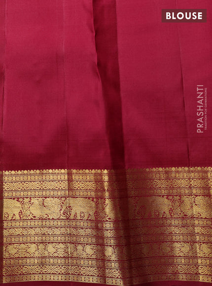 Pure kanchipuram Silk Saree maroon with allover zari woven brocade weaves and rich zari woven border
