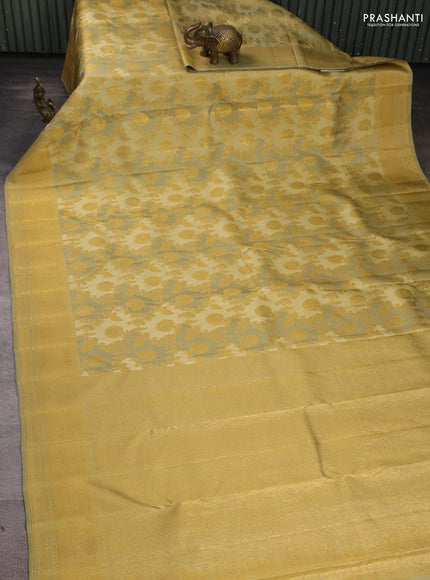 Pure kanchipuram Silk Saree mild pista green with allover zari woven rangkat weaves and rich zari woven border
