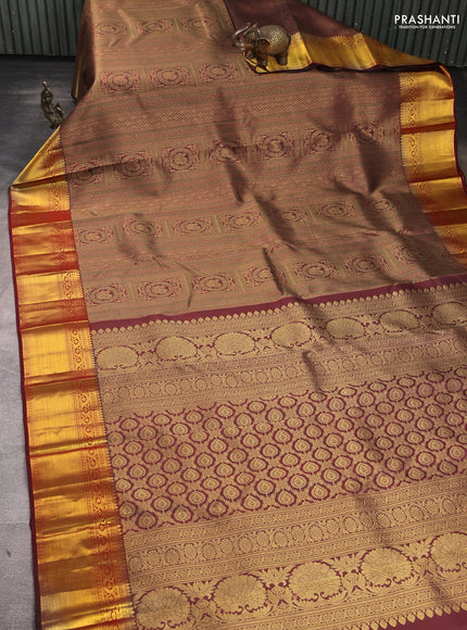 Pure kanchipuram Silk Saree maroon with allover zari woven brocade weaves and rich zari woven border