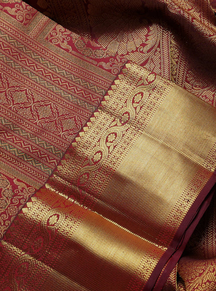 Pure kanchipuram Silk Saree maroon with allover zari woven brocade weaves and rich zari woven border