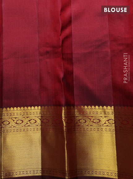 Pure kanchipuram Silk Saree maroon with allover zari woven brocade weaves and rich zari woven border