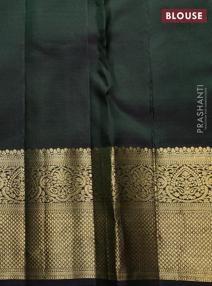 Pure kanchipuram Silk Saree bottle green with allover zari woven brocade weaves and rich zari woven border