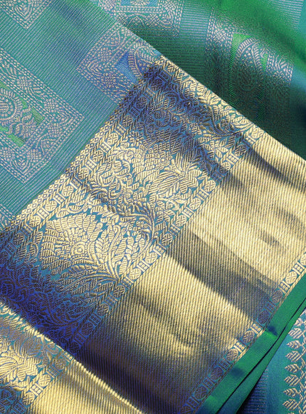 Pure kanchipuram Silk Saree dual tone bluish green with allover zari woven brocade weaves and rich zari woven border