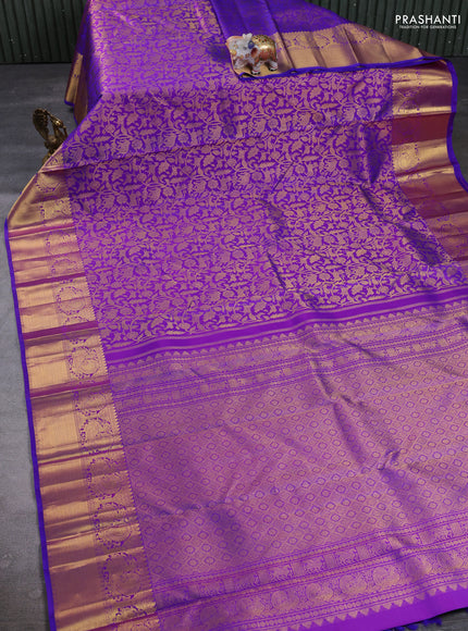 Pure kanchipuram Silk Saree purple with allover zari woven brocade weaves and rich annam zari woven border