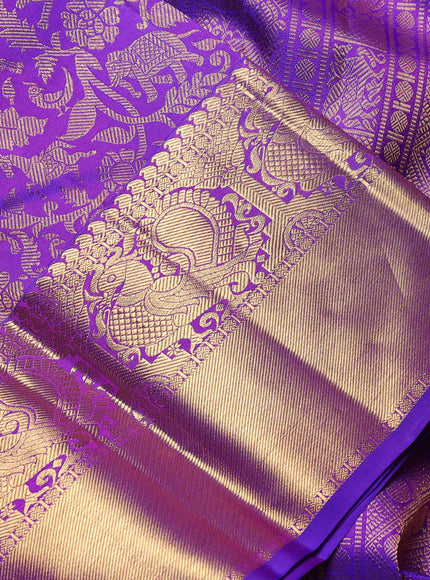 Pure kanchipuram Silk Saree purple with allover zari woven brocade weaves and rich annam zari woven border
