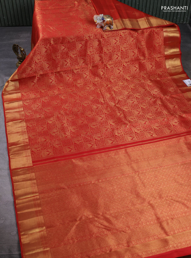 Pure kanchipuram Silk Saree rust shade with allover zari woven brocade weaves and rich zari woven border
