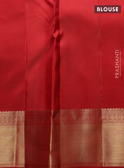 Pure kanchipuram Silk Saree rust shade with allover zari woven brocade weaves and rich zari woven border