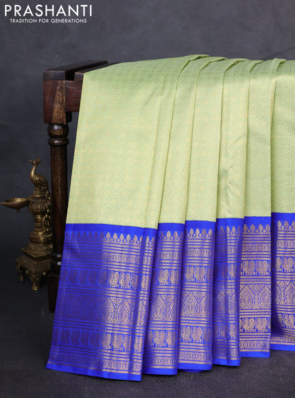 Pure kanchipuram Silk Saree pista green and royal blue with allover zari woven brocade weaves and long rich zari woven korvai border