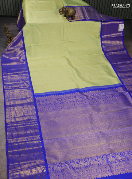Pure kanchipuram Silk Saree pista green and royal blue with allover zari woven brocade weaves and long rich zari woven korvai border