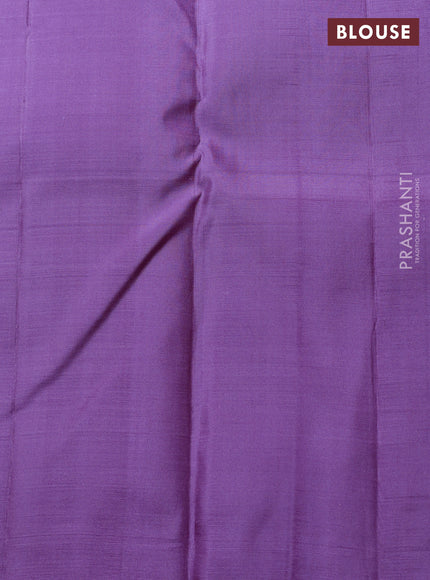 Pure Kanchipuram Silk Saree pastel purple and mild purple with allover silver & gold zari weaves and long zari woven butta border