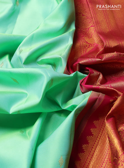 Pure Kanchipuram Silk Saree pista green and pink with zari woven buttas and temple design zari woven border