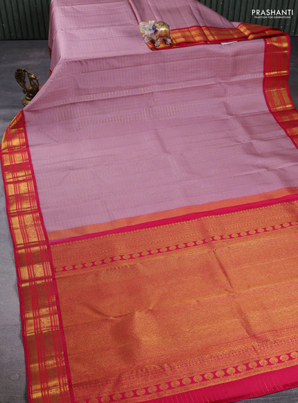 Pure Kanchipuram Silk Saree pastel pink and pink with allover zari woven checked pattern and rich annam zari woven border