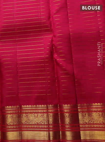 Pure Kanchipuram Silk Saree pastel pink and pink with allover zari woven checked pattern and rich annam zari woven border