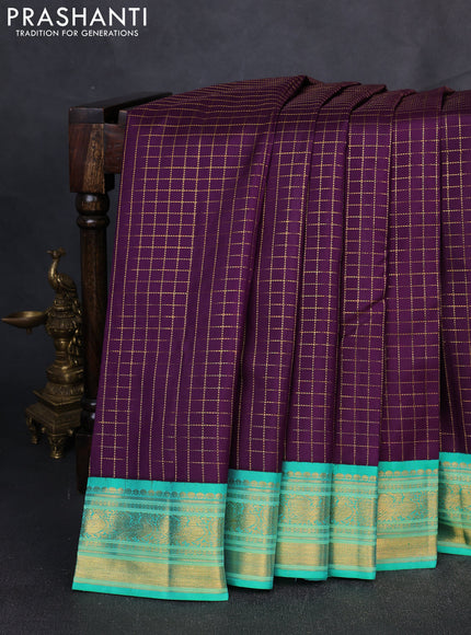 Pure Kanchipuram Silk Saree purple and green with allover zari woven checked pattern and rich annam zari woven border