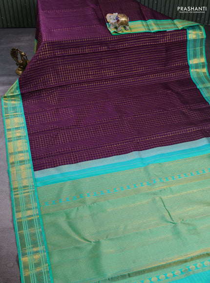 Pure Kanchipuram Silk Saree purple and green with allover zari woven checked pattern and rich annam zari woven border