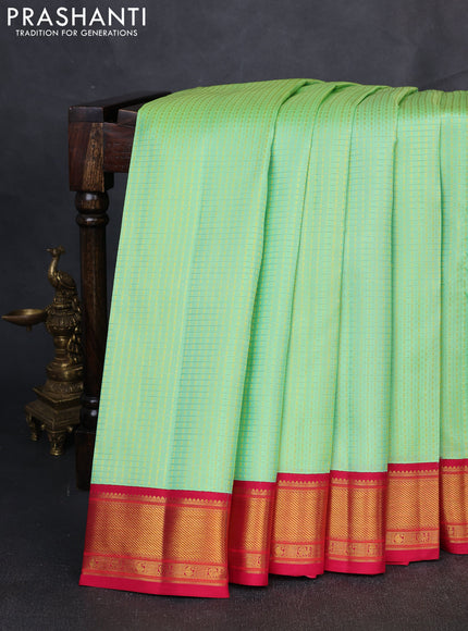 Pure Kanchipuram Silk Saree pista green and pink with allover small zari checks & self emboss and rich zari woven border