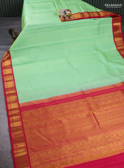 Pure Kanchipuram Silk Saree pista green and pink with allover small zari checks & self emboss and rich zari woven border