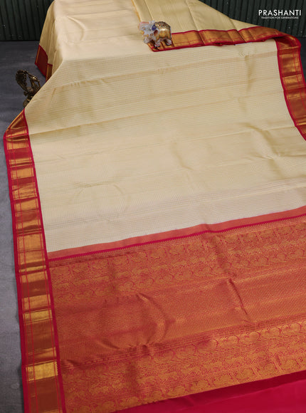 Pure Kanchipuram Silk Saree cream and pink with allover small zari checks & self emboss and rich zari woven border