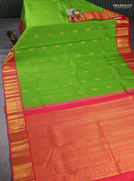 Pure Kanchipuram Silk Saree parrot green and dual tone pinkish orange with paisley zari woven buttas and rich zari woven border