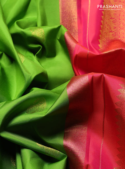Pure Kanchipuram Silk Saree parrot green and dual tone pinkish orange with paisley zari woven buttas and rich zari woven border