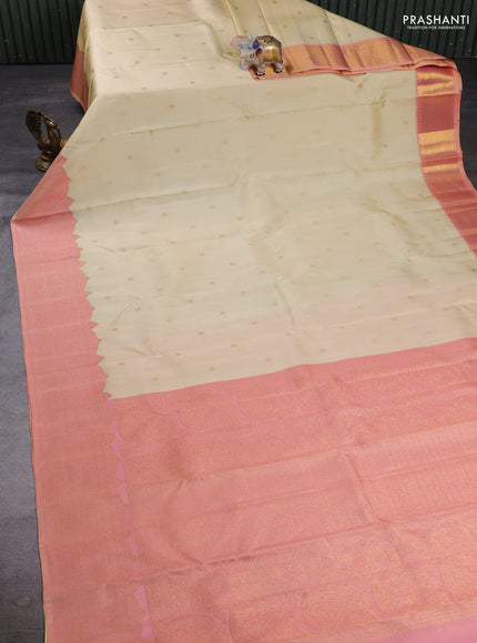 Pure Kanchipuram Silk Saree cream and peach orange with zari woven buttas and rich zari woven border