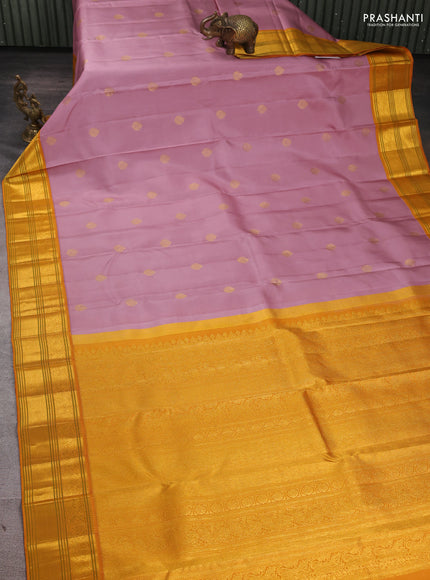 Pure Kanchipuram Silk Saree pastel pink and mustard yellow with zari woven buttas and rich zari woven border