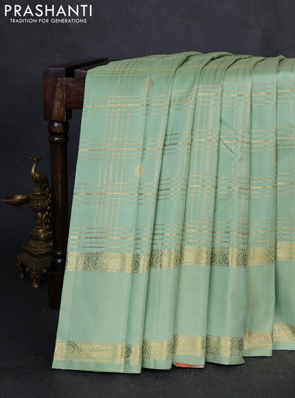 Pure Kanchipuram Silk Saree pista green with allover zari checks & buttas and rich zari woven border