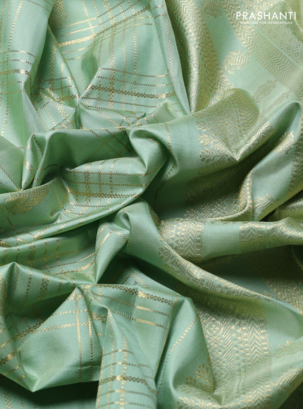 Pure Kanchipuram Silk Saree pista green with allover zari checks & buttas and rich zari woven border