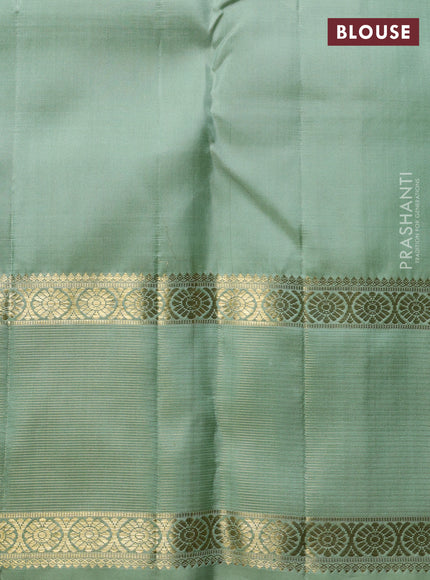 Pure Kanchipuram Silk Saree pista green with allover zari checks & buttas and rich zari woven border
