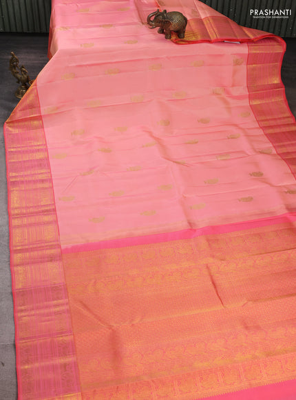 Pure Kanchipuram Silk Saree Peach and peach orange with paisley zari woven buttas and rich zari woven border