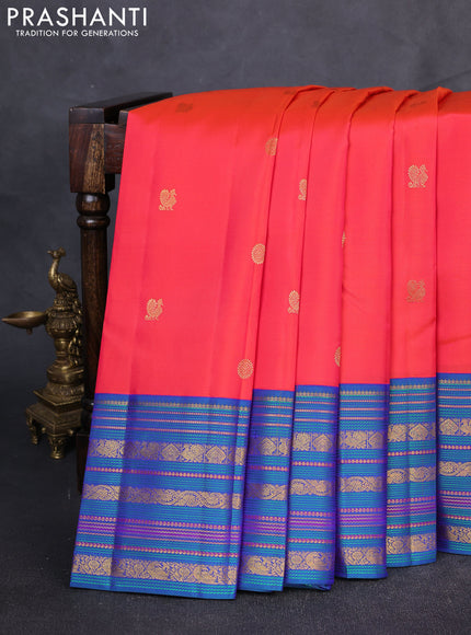 Pure Kanchipuram Silk Saree dual tone pinkish orange and dual tone blue with annam & rudhraksha zari woven buttas and rich zari woven korvai border