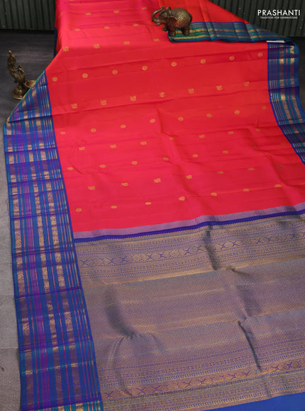 Pure Kanchipuram Silk Saree dual tone pinkish orange and dual tone blue with annam & rudhraksha zari woven buttas and rich zari woven korvai border