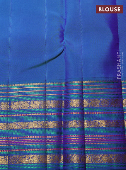 Pure Kanchipuram Silk Saree dual tone pinkish orange and dual tone blue with annam & rudhraksha zari woven buttas and rich zari woven korvai border