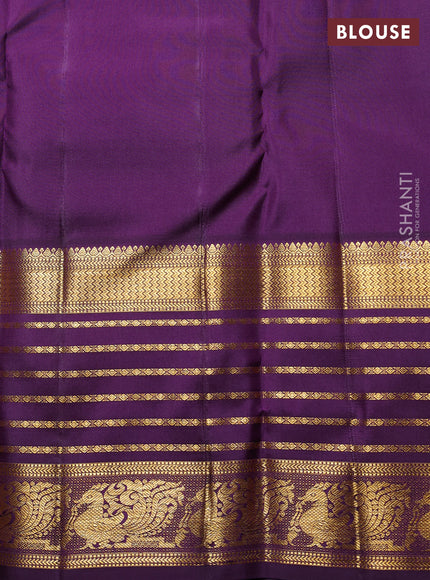 Pure Kanchipuram Silk Saree dual shade of maroon and deep violet with paisley zari woven buttas and long zari woven border