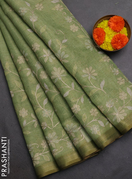 Linen Cotton Saree light green with allover embroidery work and zari woven border