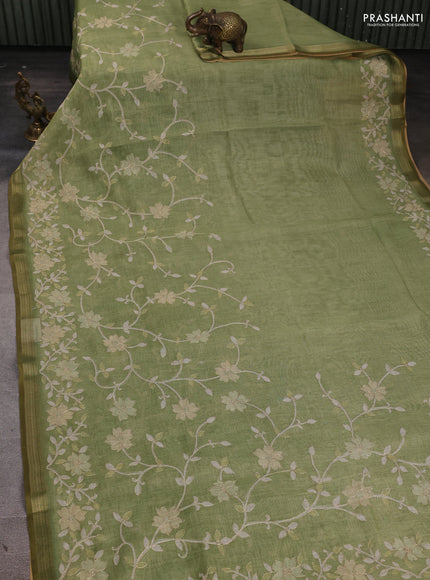 Linen Cotton Saree light green with allover embroidery work and zari woven border