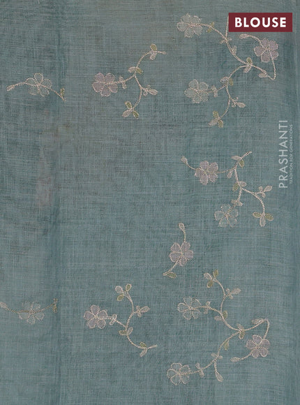 Linen Cotton Saree teal green shade with allover embroidery work and zari woven border