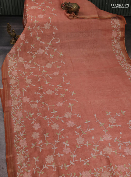 Linen Cotton Saree rust shade with allover embroidery work and zari woven border