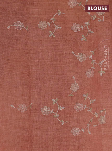 Linen Cotton Saree rust shade with allover embroidery work and zari woven border