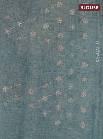 Linen Cotton Saree teal green shade with embroidery work and zari woven border