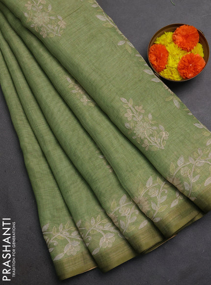 Linen Cotton Saree light green with allover embroidery work and zari woven border