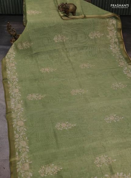 Linen Cotton Saree light green with allover embroidery work and zari woven border