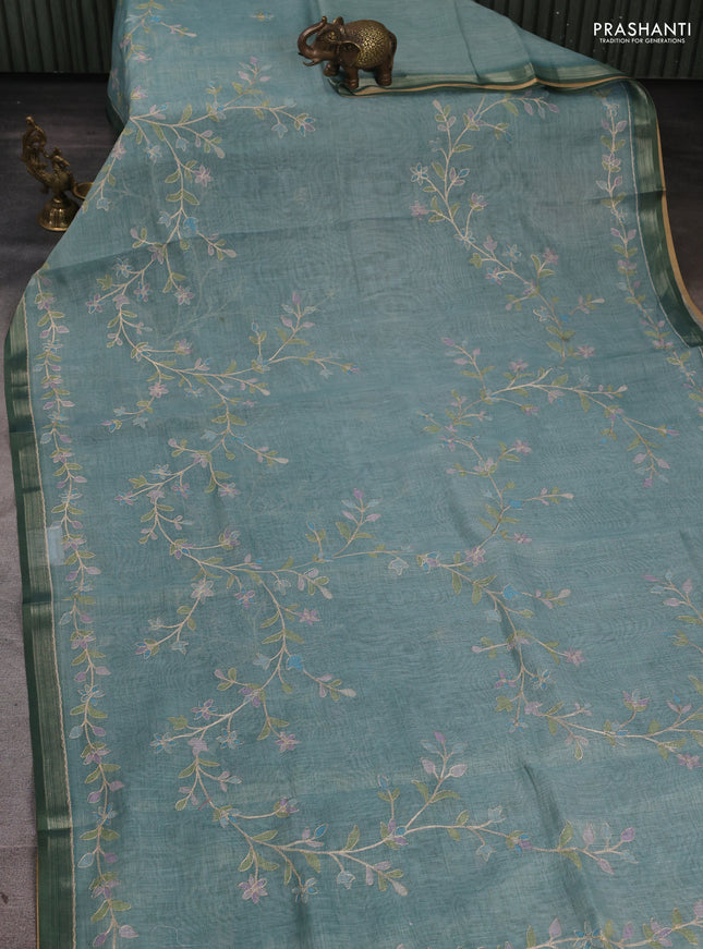 Linen Cotton Saree teal blue with allover embroidery work and zari woven border