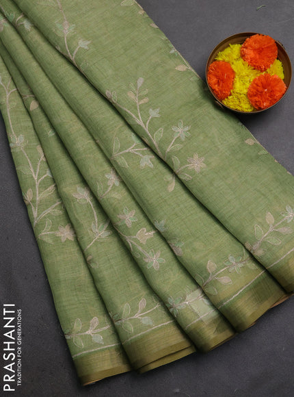 Linen Cotton Saree light green with allover embroidery work and zari woven border