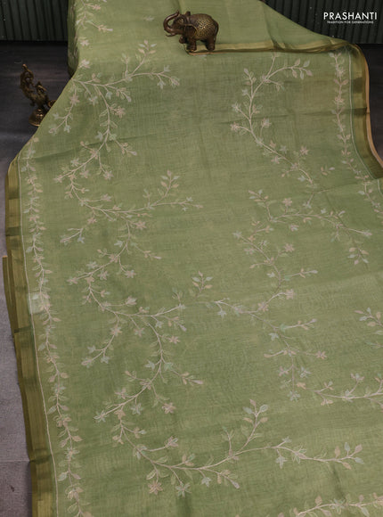 Linen Cotton Saree light green with allover embroidery work and zari woven border