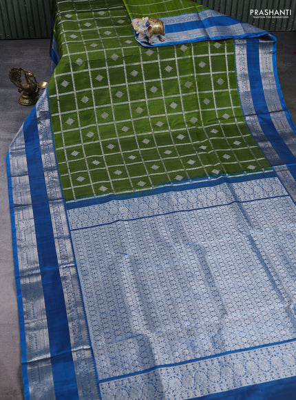 Venkatagiri Silk Saree mehendi green and cs blue with allover silver zari checks & buttas and rettapet zari woven border